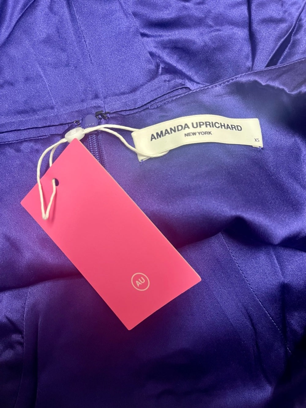 Amanda Uprichard Fiorella Silk Ruched Mini Dress in Deep Purple — hemline and garment finish