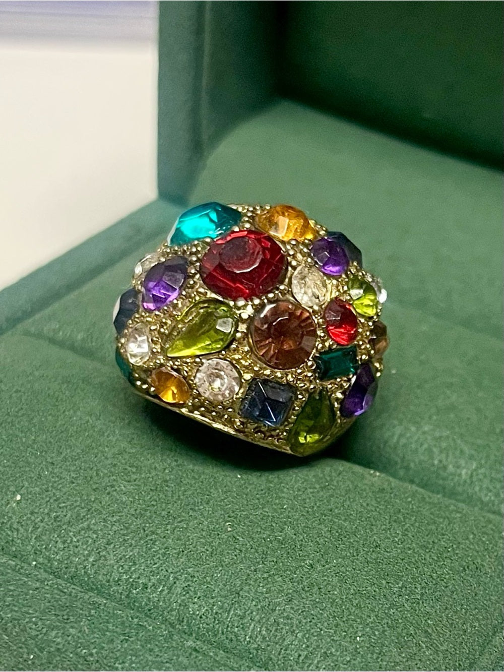 Anthropologie Gold-Tone Dome Statement Ring with Multicolored Vibrant Crystals — statement accessory profile and scale