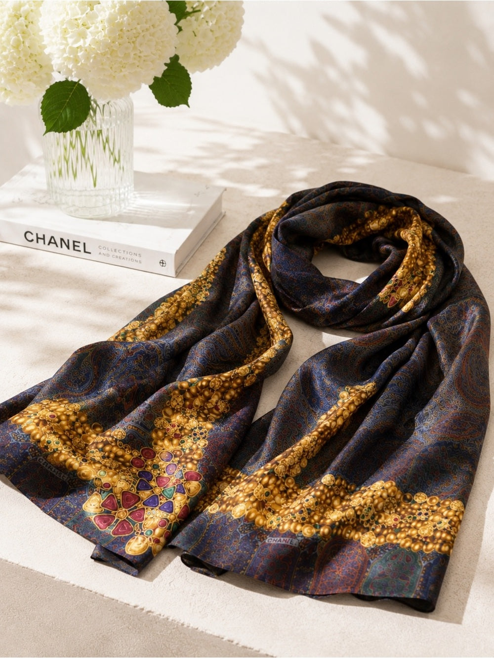 CHANEL Silk Scarf – Ornate Gold Chain & Jewel Motif on Deep Navy — designer motif and silk print closeup