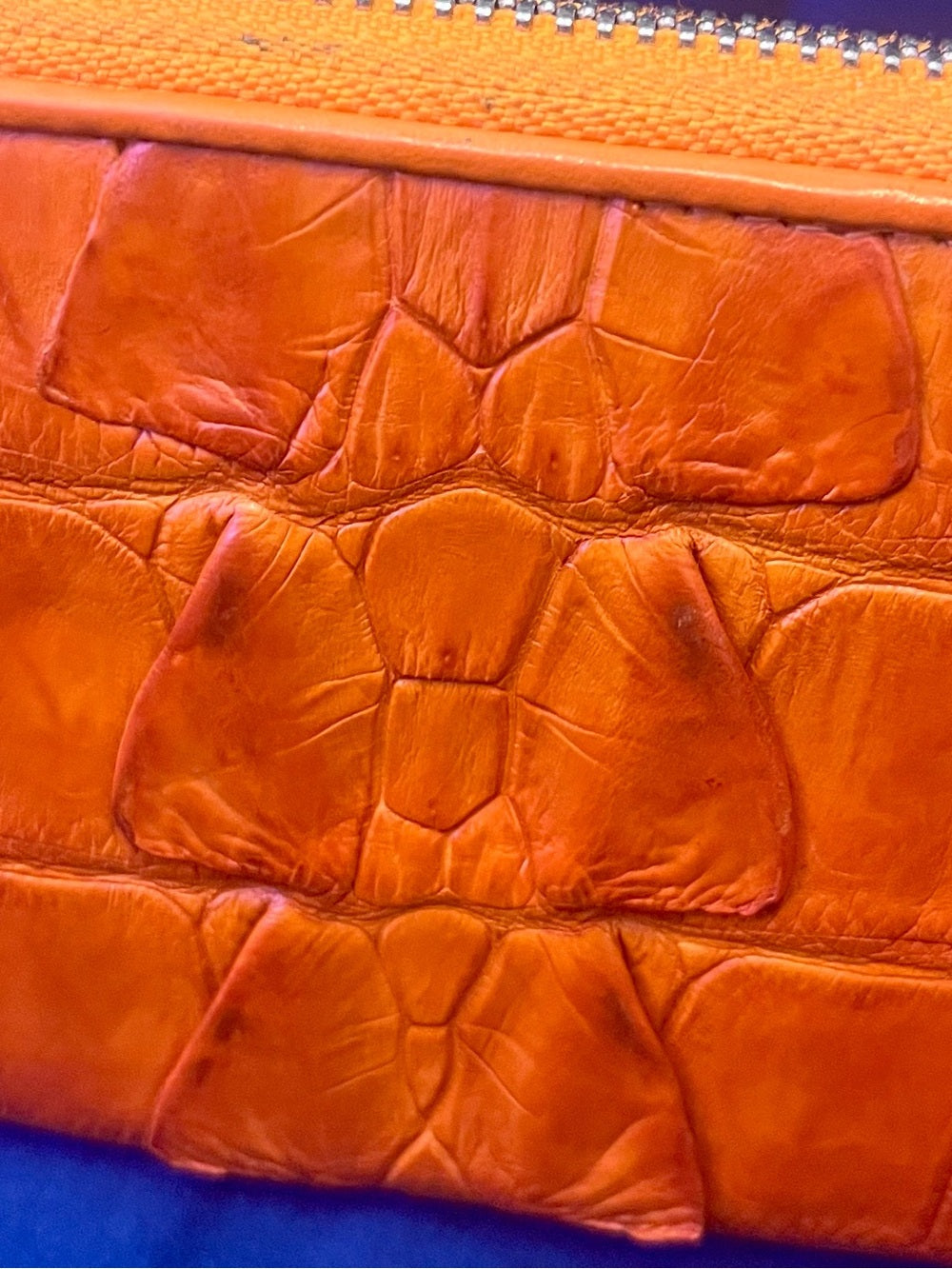 Genuine Crocodile Leather Zip Around Wallet – Vibrant Orange Exotic Long Wallet — natural leather grain and texture closeup