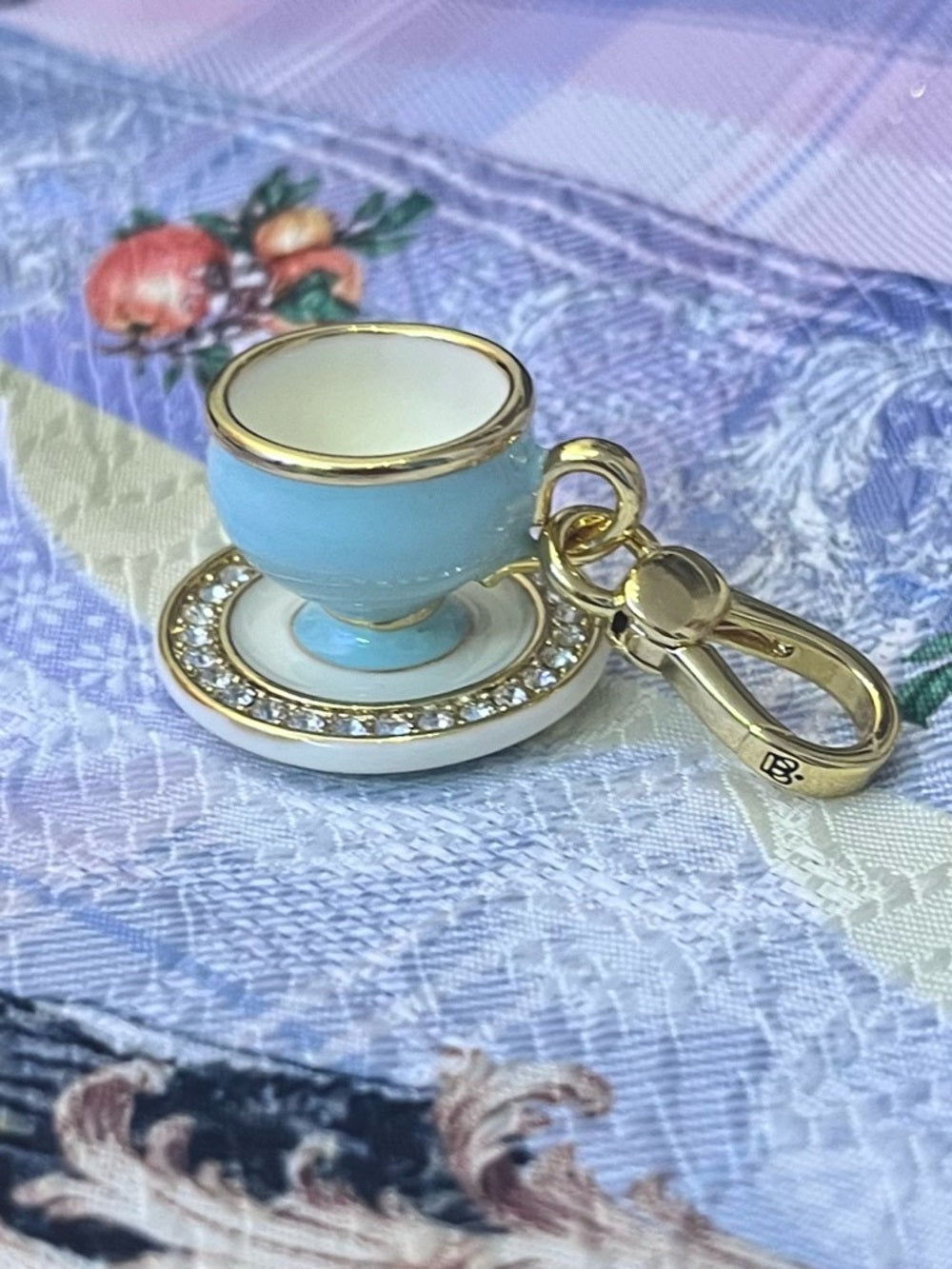 Juicy Couture Gold-Trim Crystal-Halo Blue Teacup Charm / Pendant / Keychain — pave crystal jewelry sparkle closeup