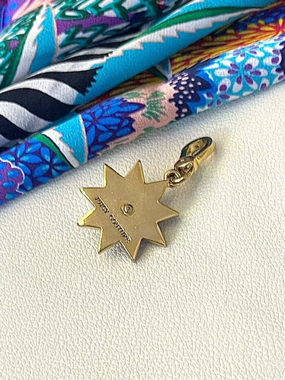 Juicy Couture Gold Starburst Crystal Charm - Yellow, Orange and Clear Pave — enamel color and jeweled accent detail