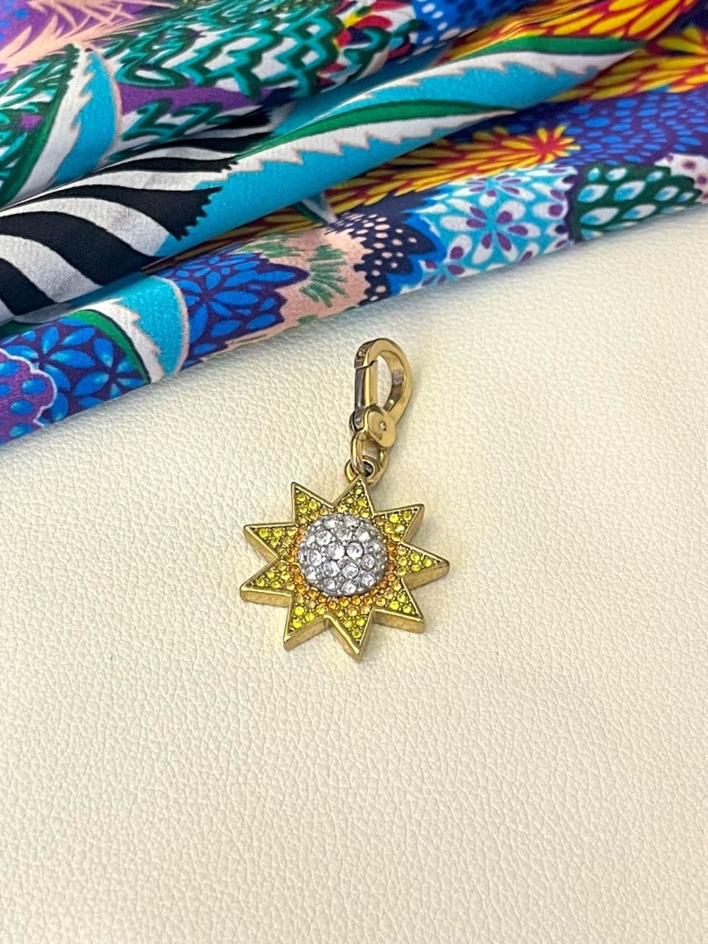 Juicy Couture Gold Starburst Crystal Charm - Yellow, Orange and Clear Pave — three dimensional collectible charm design