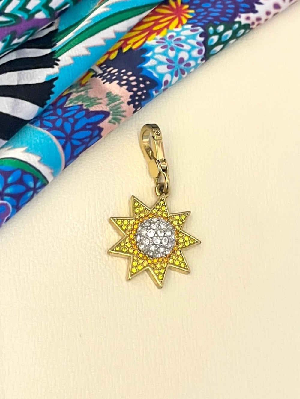 Juicy Couture Gold Starburst Crystal Charm - Yellow, Orange and Clear Pave — designer charm crystal pave craftsmanship