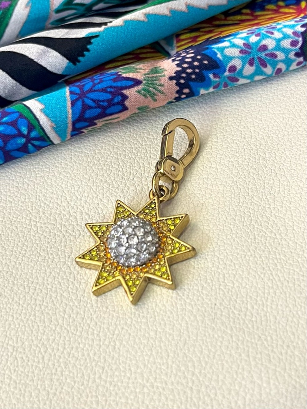 Juicy Couture Gold Starburst Crystal Charm - Yellow, Orange and Clear Pave — gold tone charm sculptural metalwork