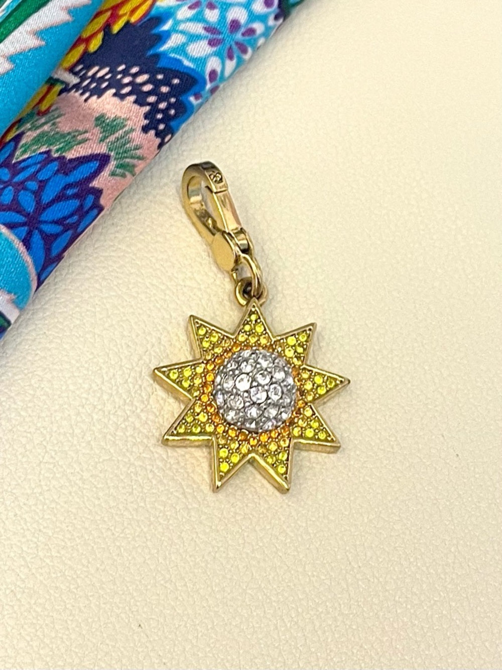 Juicy Couture Gold Starburst Crystal Charm - Yellow, Orange and Clear Pave — pave crystal jewelry sparkle closeup