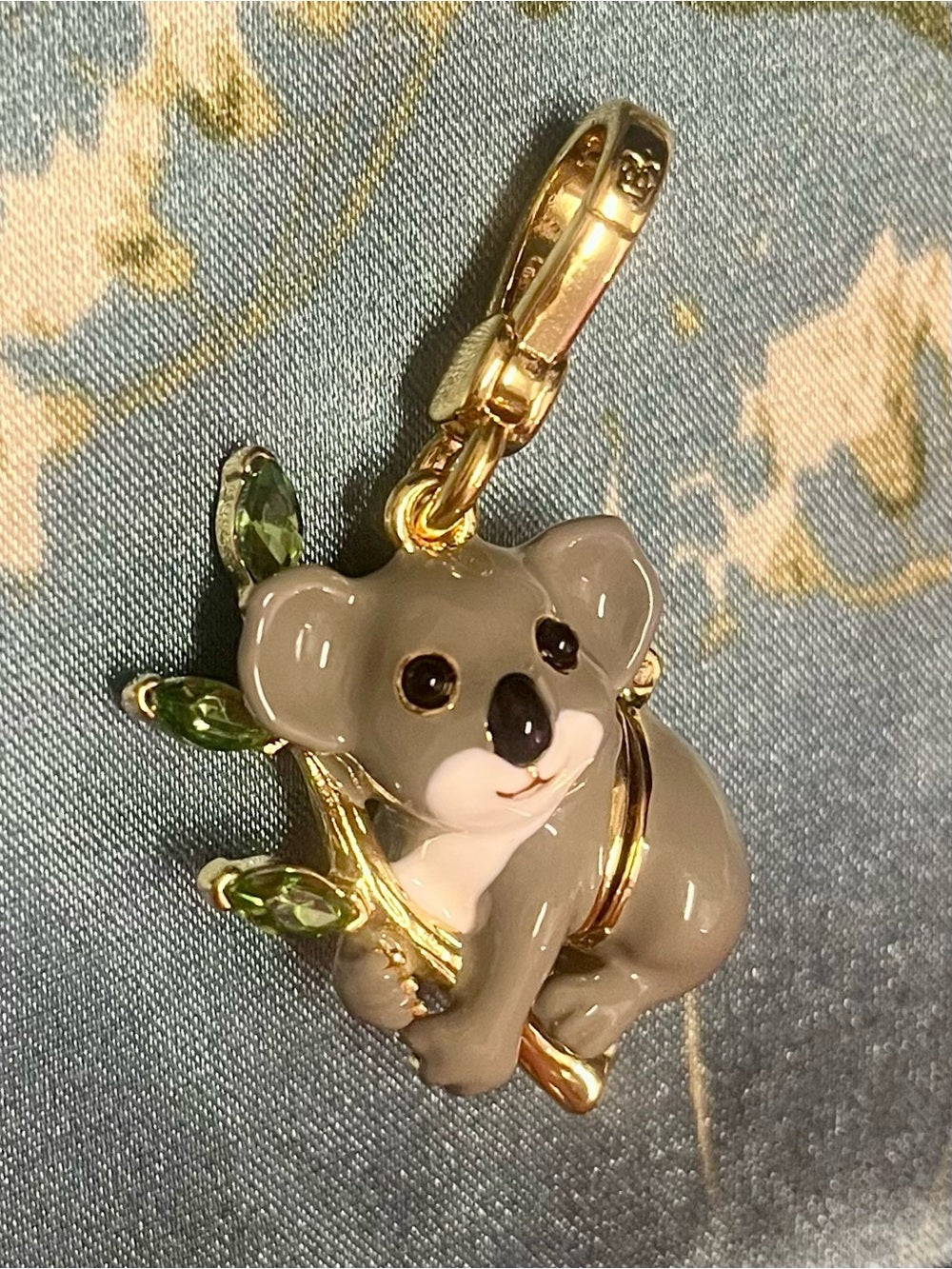 Juicy Couture Koala Charm/Pendant in Gray and Gold w Eucalyptus and Baby Koala — gray enamel koala jewelry closeup