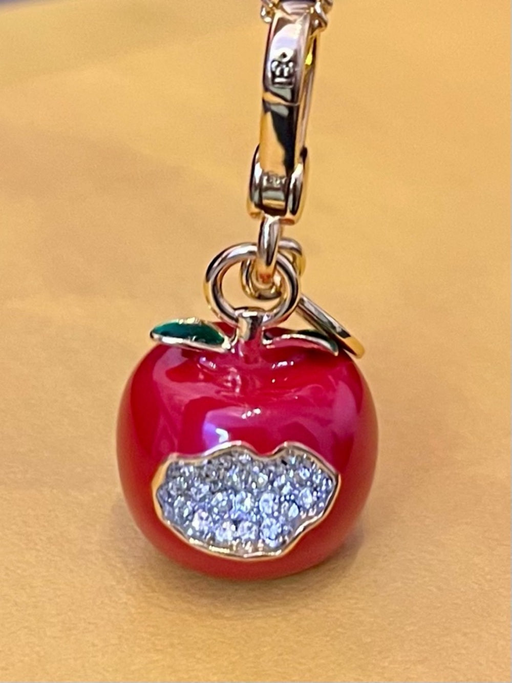 Juicy Couture Red Enamel Apple Charm with Crystal Pavé Bite Limited Edition 2012 — pave crystal jewelry sparkle closeup (additional view 2)