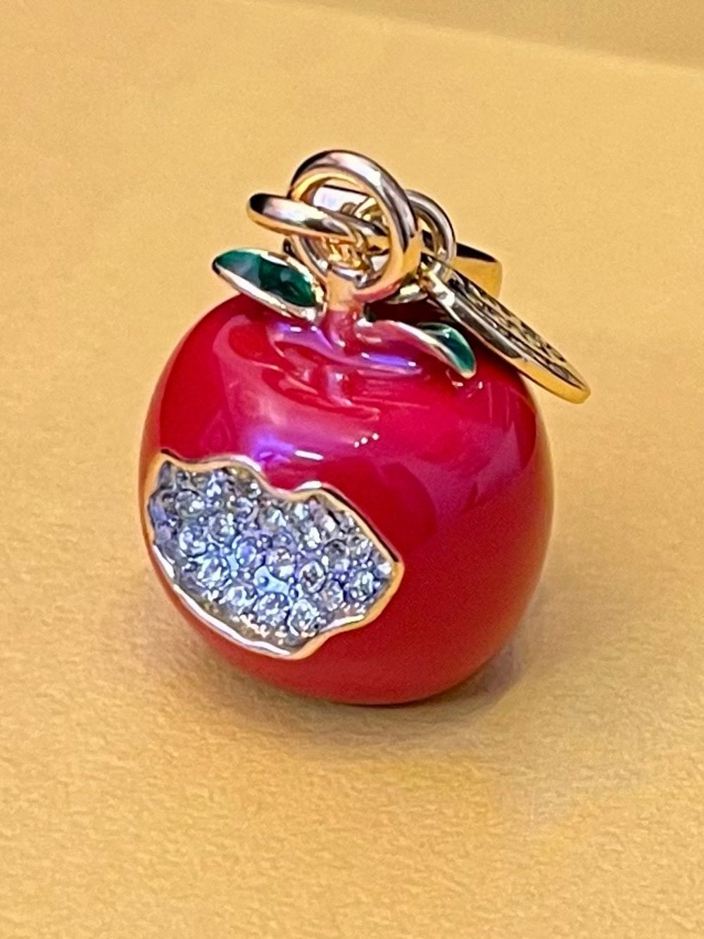 Juicy Couture Red Enamel Apple Charm with Crystal Pavé Bite Limited Edition 2012 — enamel color and jeweled accent detail