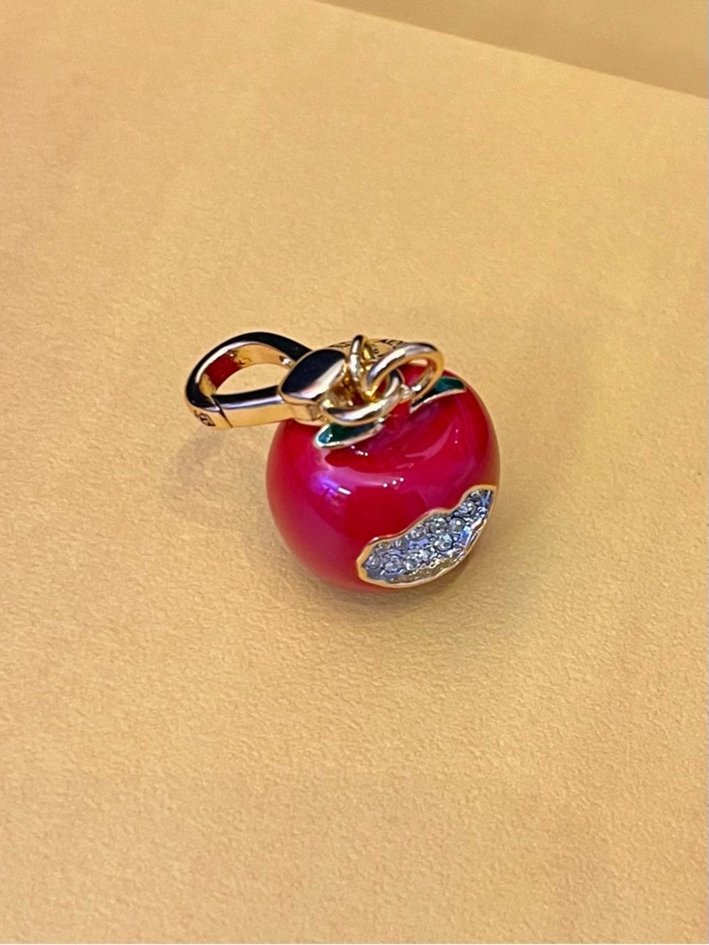 Juicy Couture Red Enamel Apple Charm with Crystal Pavé Bite Limited Edition 2012 — charm back logo and branding detail