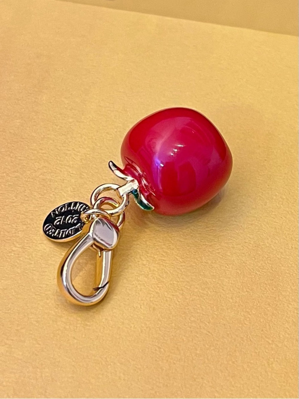 Juicy Couture Red Enamel Apple Charm with Crystal Pavé Bite Limited Edition 2012 — jewelry clasp loop and hardware closeup