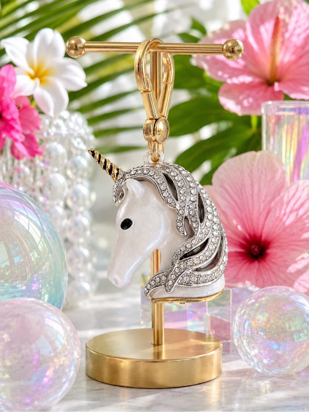 Juicy Couture Jeweled Unicorn Charm – Pearlescent White & Crystal Gold — front view editorial photo