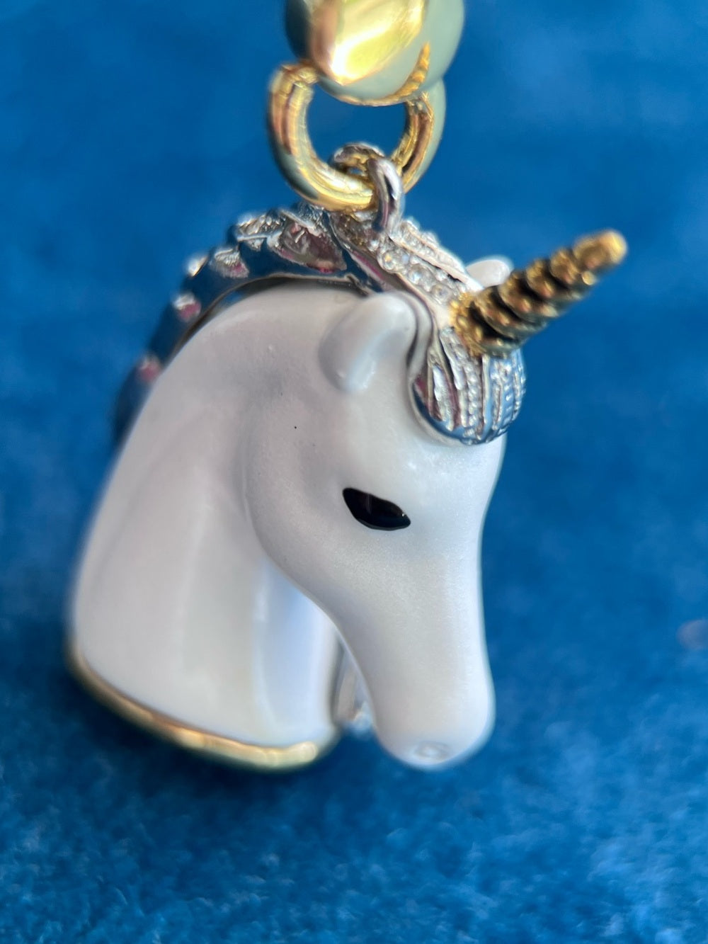 Juicy Couture Jeweled Unicorn Charm – Pearlescent White & Crystal Gold — side closeup