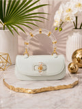 Mint Green Bag with Clear Acrylic Bamboo & Gold Trim Handle + Crossbody Strap — designer exotic leather handbag silhouette