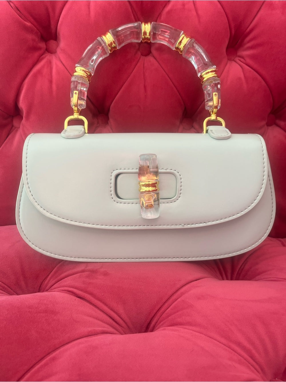 Mint Green Bag with Clear Acrylic Bamboo & Gold Trim Handle + Crossbody Strap — corner piping and leather edge detail