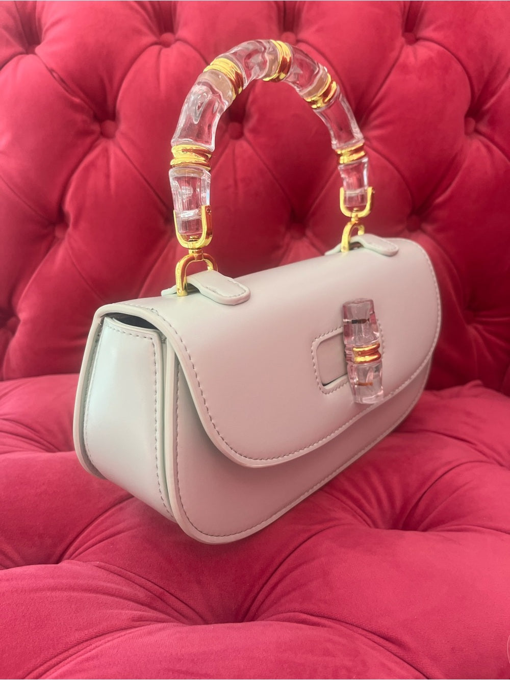 Mint Green Bag with Clear Acrylic Bamboo & Gold Trim Handle + Crossbody Strap — bag closure fastening and edge finish
