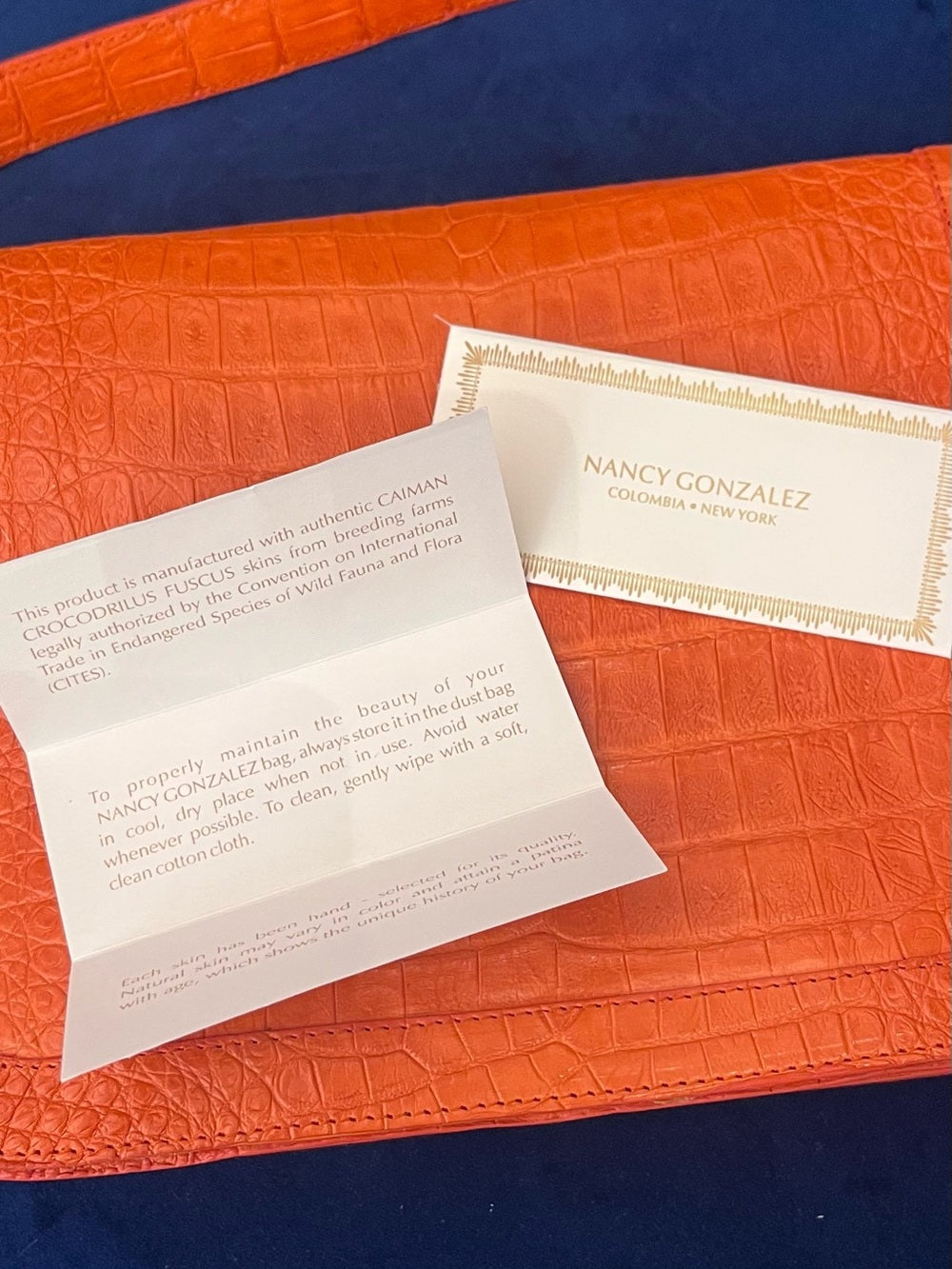 Nancy Gonzalez Genuine Caiman Crocodile Shoulder Bag Orange Exotic Leather — interior pocket and designer label