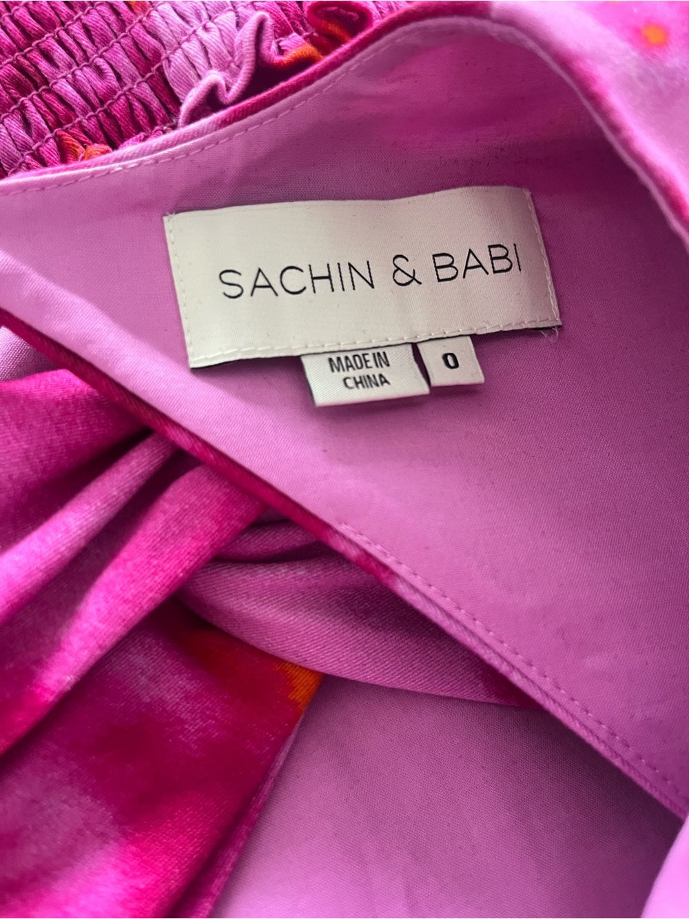 Sachin + Babi Pink and Magenta Tie-Dye Sleeveless Crop Top — designer branding and logo closeup