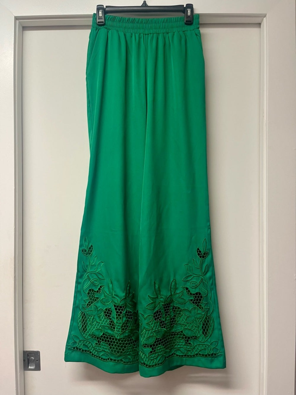 Smocked-Waist Wide Leg Pants in Emerald Green with Embroidered Hem — fashion back design and construction
