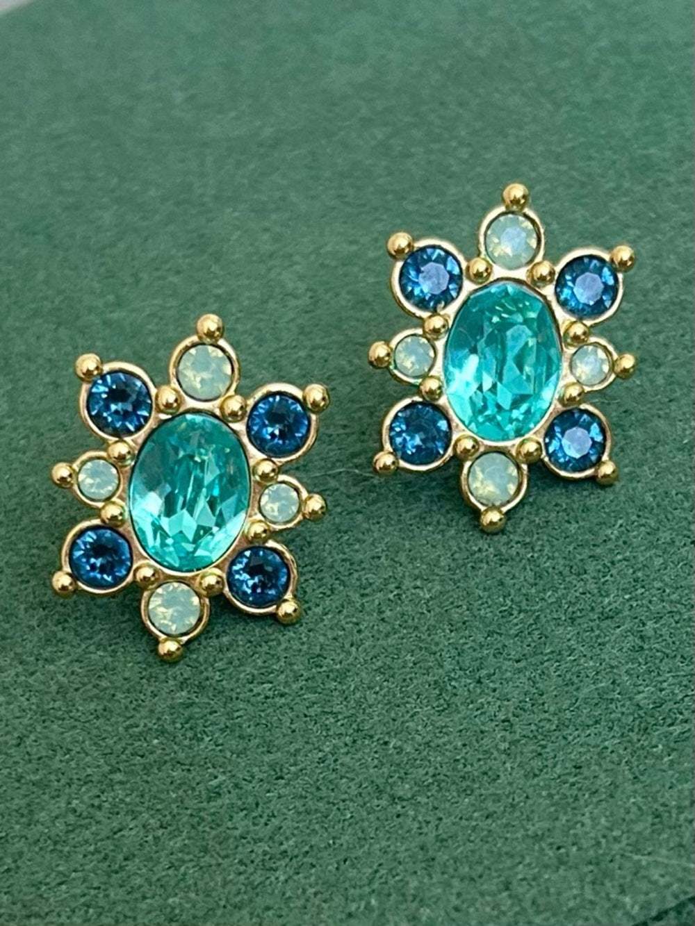 Swarovski Teal Crystal Flower Stud Earrings – Blue & Opal, Gold Tone Statement — designer jewelry sparkle closeup