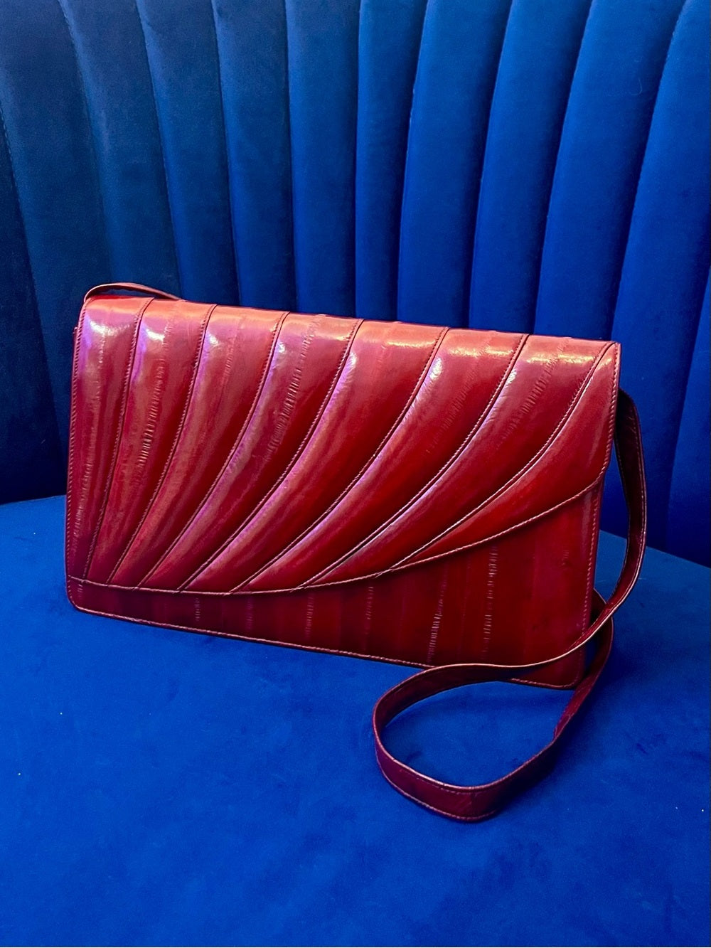 Vintage Red Eel Skin Clutch Textured Exotic Leather Structured Crossbody — natural leather grain and texture closeup
